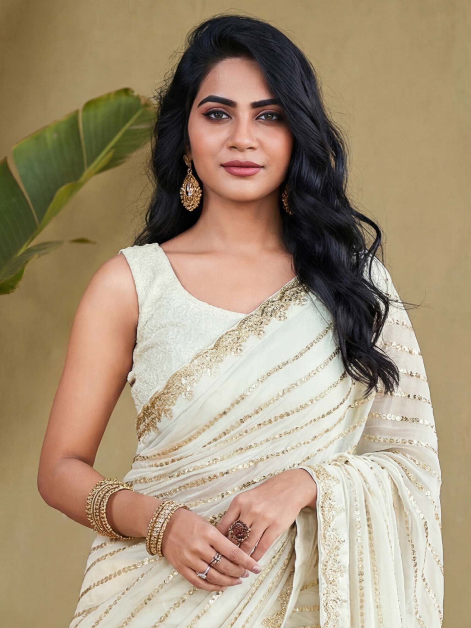 Off White Embellished Sequined Work Georgette Saree with Unstitched Blouse